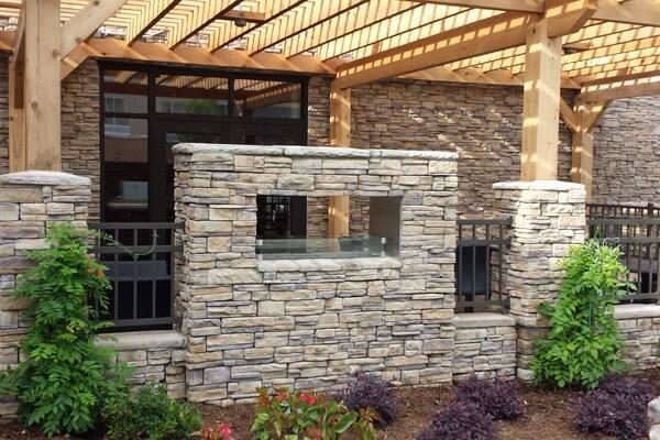 square propane fire pit in a wall
