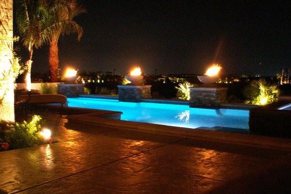 planter propane fire pots next to pool