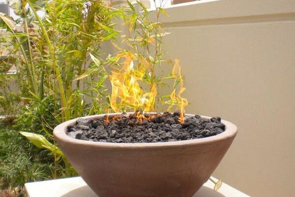 propane fire pit in a planter