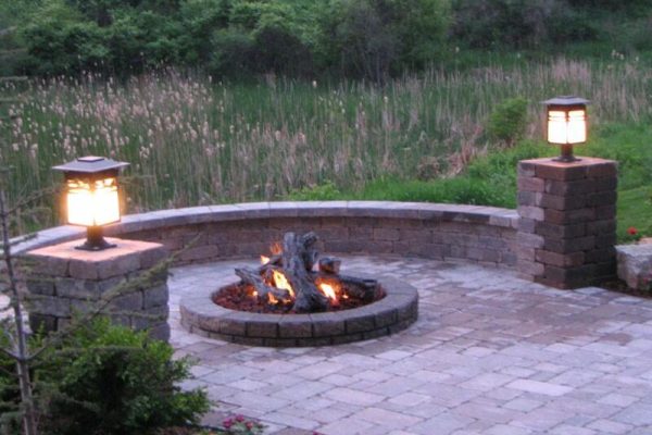 outdoor fire pit with propane and fake logs