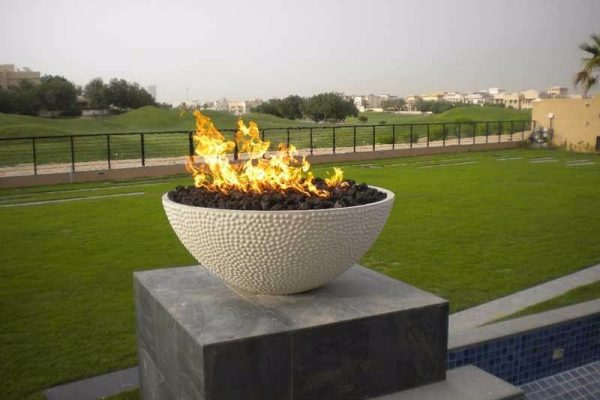 propane fire with lava rocks in a pot