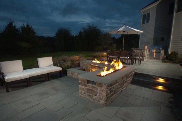 L shaped fire pit on a patio